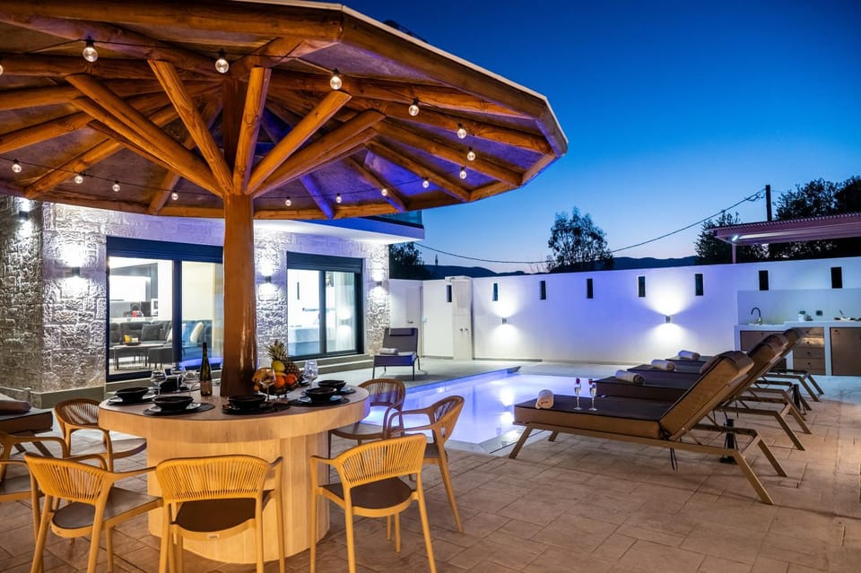 Property building, Seating area, Swimming pool, sunbed