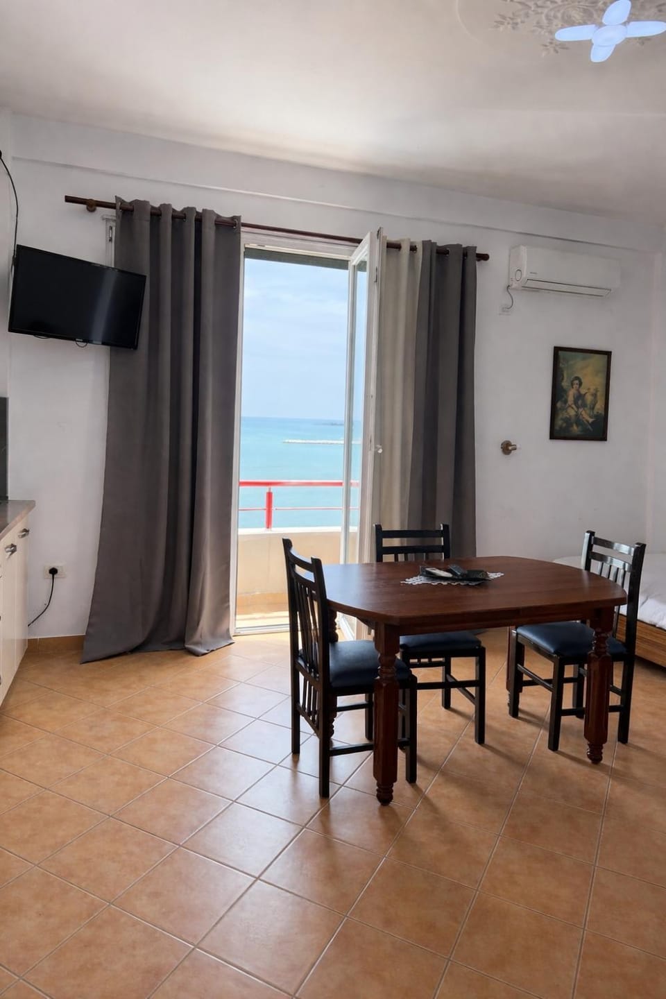Natural landscape, View (from property/room), Balcony/Terrace, Living room, Seating area, Dining area, Sea view
