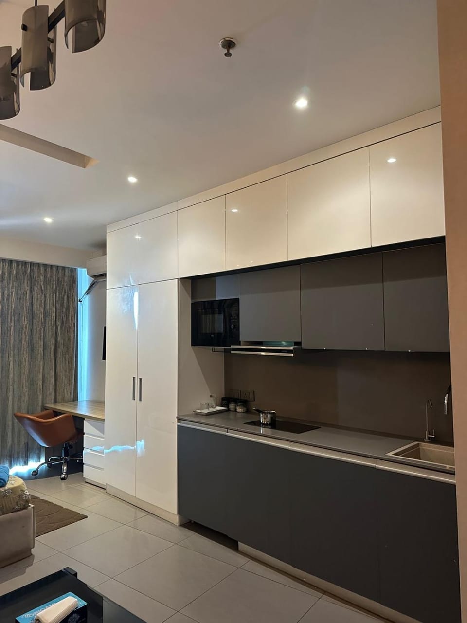 Kitchen or kitchenette, microwave, stove, wardrobe, kitchen