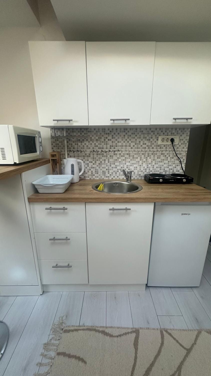 Kitchen or kitchenette, stove