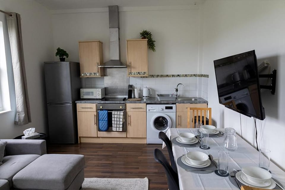 TV and multimedia, Coffee/tea facilities, Kitchen or kitchenette, Living room, Food and drinks, Seating area, Dining area, Food, oven, stove, toaster