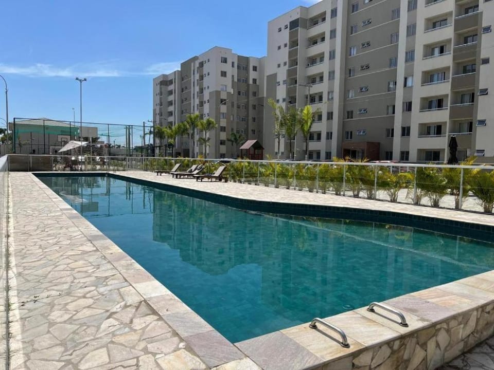 Property building, Day, Pool view, Swimming pool, sunbed