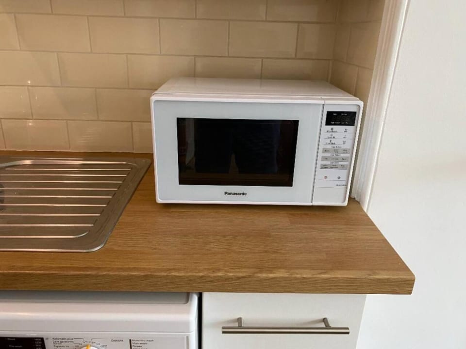 Kitchen or kitchenette, microwave