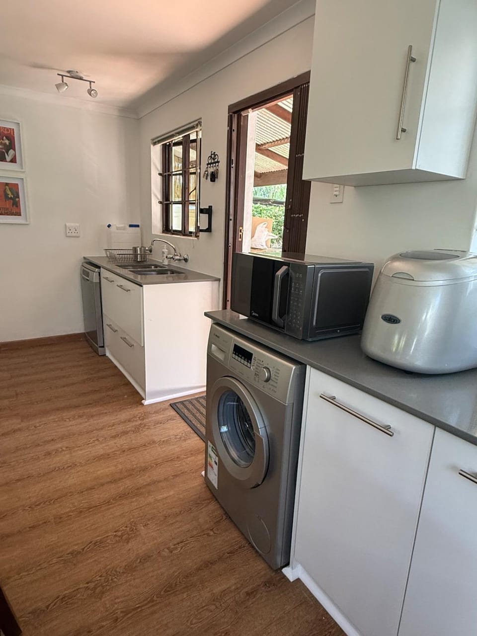 Kitchen or kitchenette, dishwasher, microwave, washing machine
