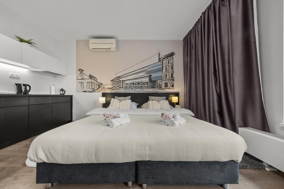Photo of the whole room, Bedroom, towels, air conditioner