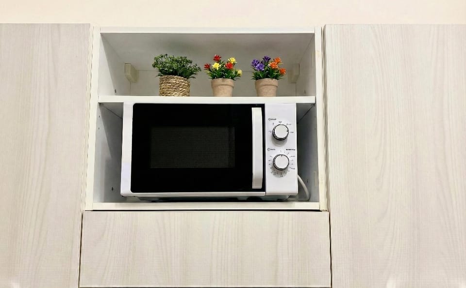 Kitchen or kitchenette, microwave