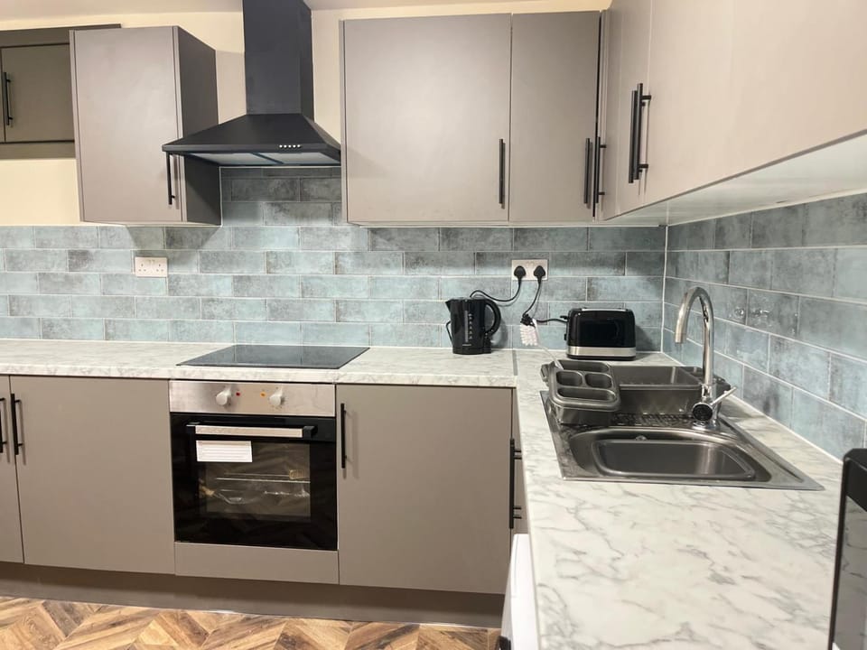 Communal kitchen, oven, stove, toaster