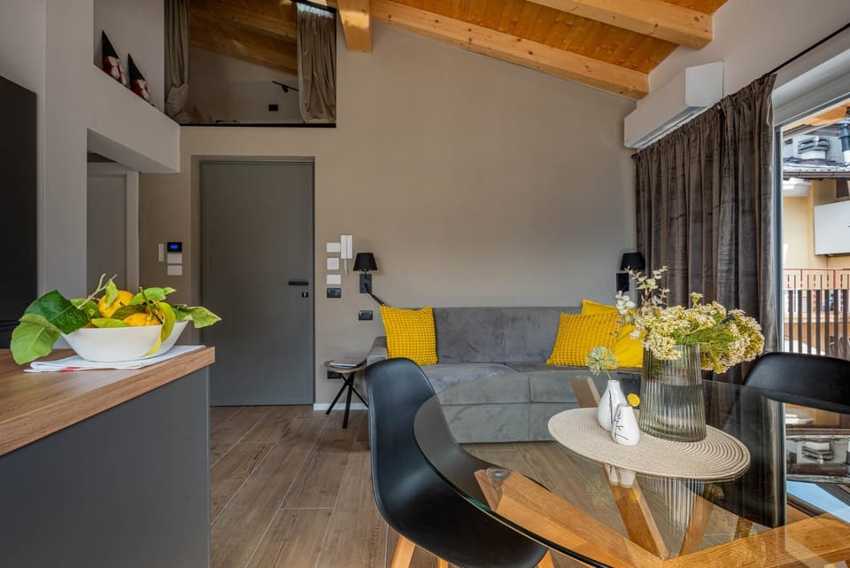 Alpine Lodge Grey by Tss - The charm of the center Apartment in Levico Terme