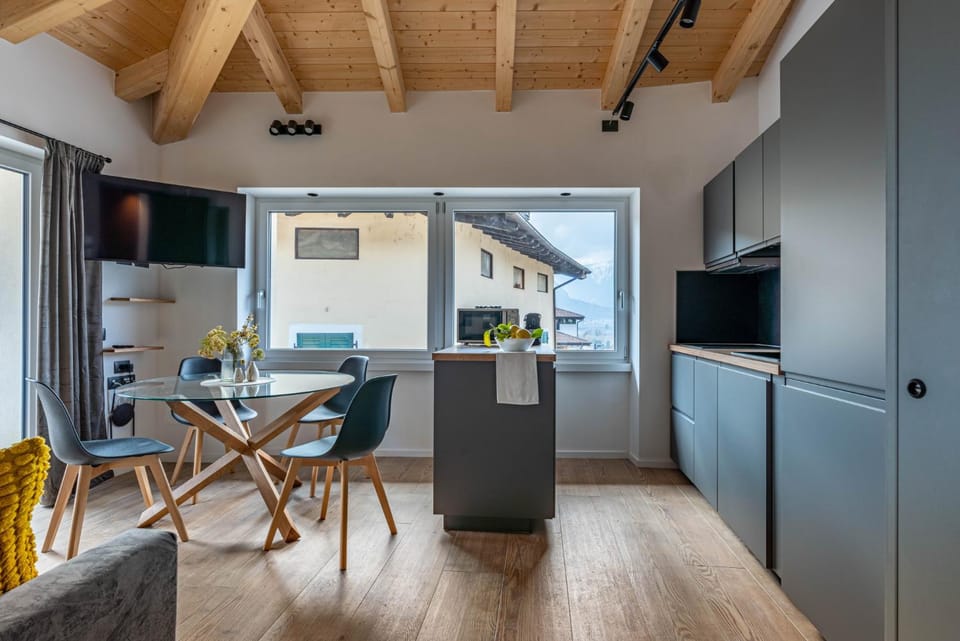 Alpine Lodge Grey by Tss - The charm of the center Apartment in Levico Terme