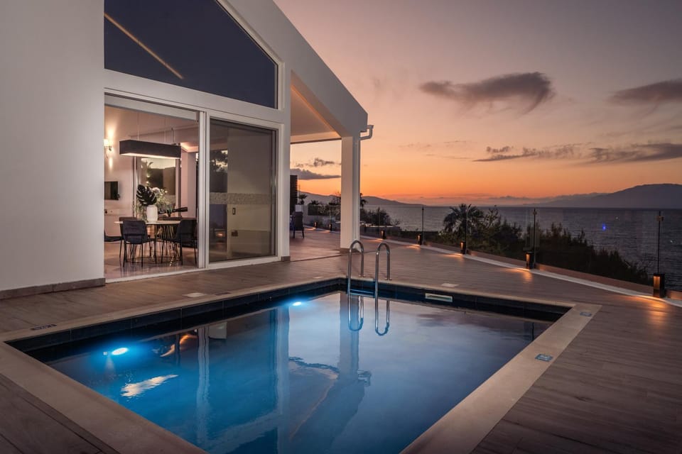 Property building, Natural landscape, Pool view, Sea view, Swimming pool, Sunset