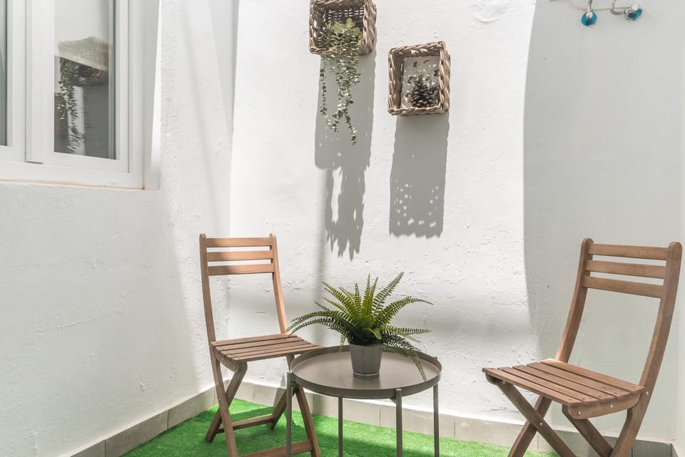 Home2Book Bright Retreat with Patio & Roof Access Apartment in Vecindario