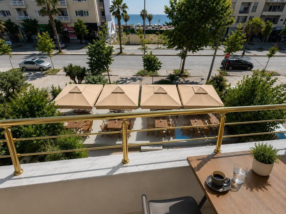 Property building, Patio, Communal lounge/ TV room, Day, Summer, View (from property/room), Balcony/Terrace, Seating area, Evening entertainment, Sea view, Sea view, Seasons, Location, Sunrise, Sunset, Parking