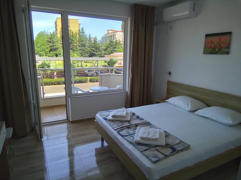 Bed, View (from property/room), Photo of the whole room, towels, air conditioner