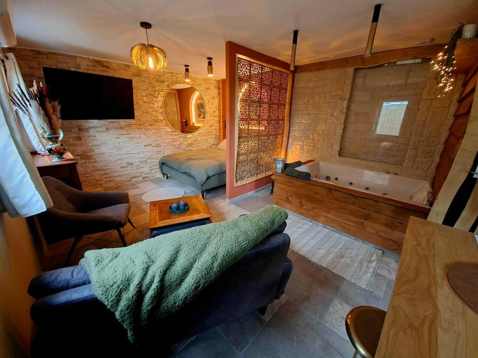 Bed, Living room, Seating area, Bedroom
