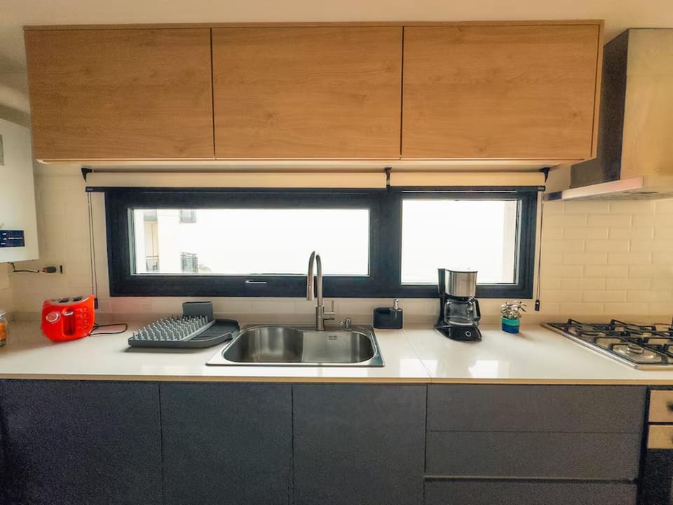 Kitchen or kitchenette, stove, toaster