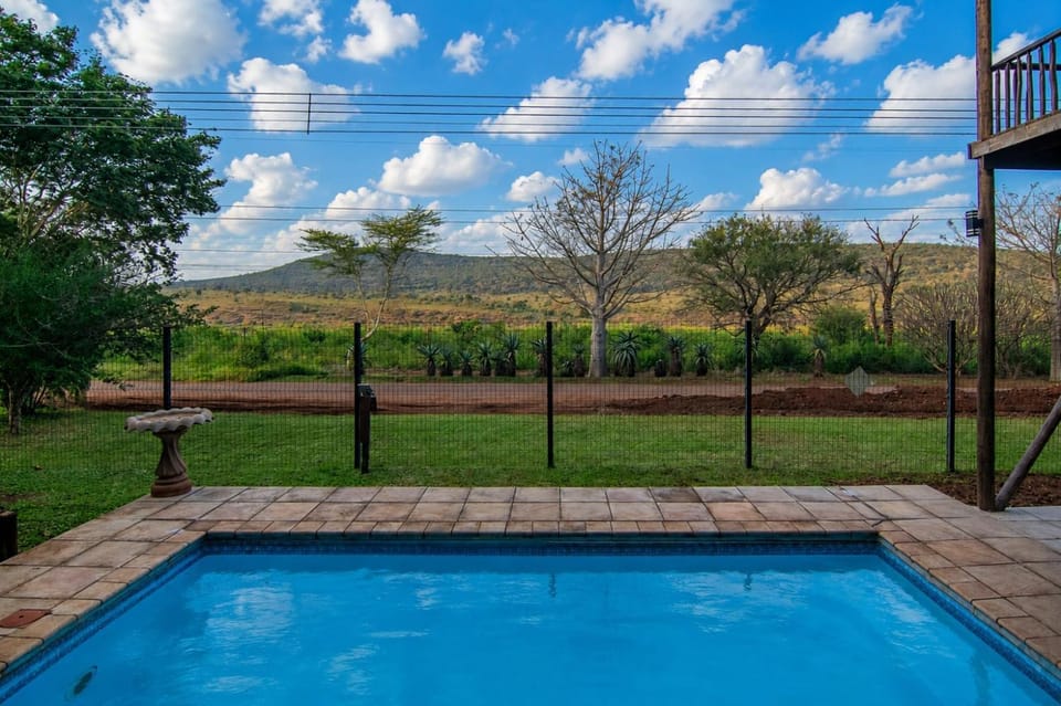 Day, Natural landscape, View (from property/room), Pool view, Swimming pool