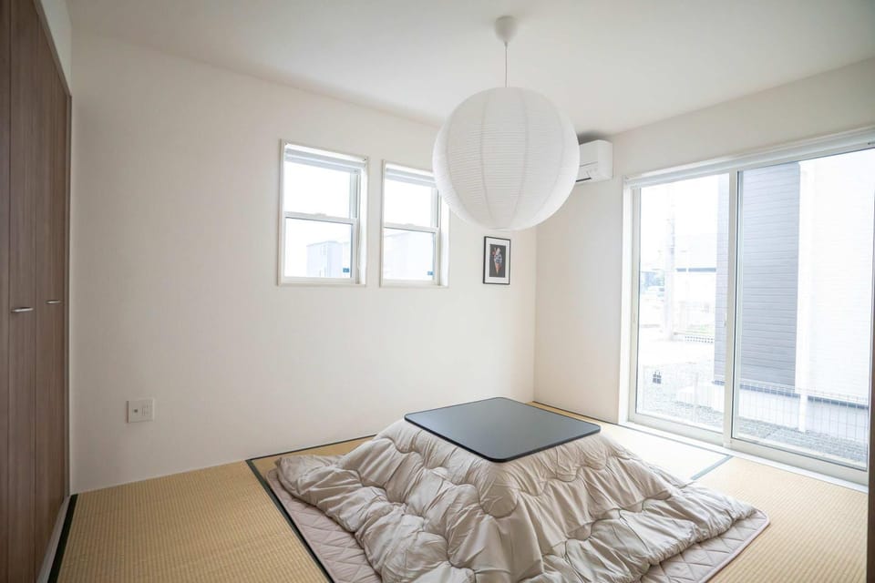 Modern 4BR Stay in Ozu Hachikubo for 11 Guests by Restavio Apartment in Japan