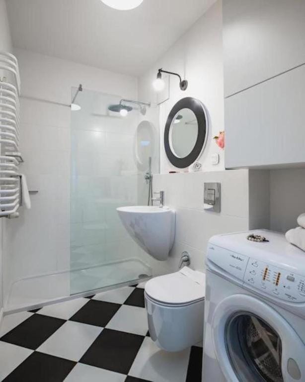Shower, towels, washing machine, dryer