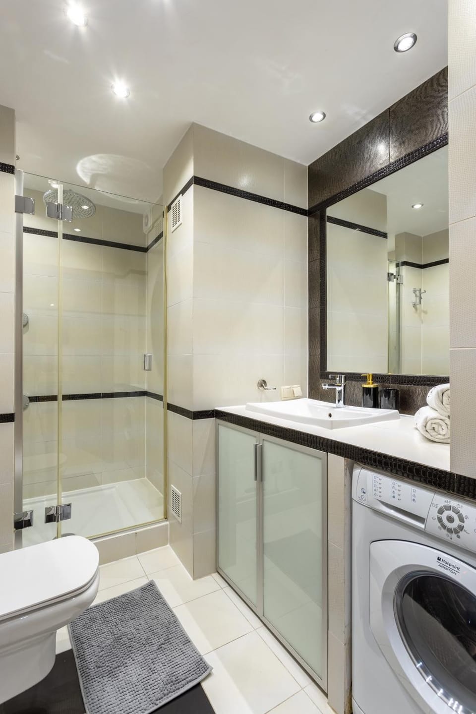 Shower, Toilet, Bathroom, towels, washing machine, dryer
