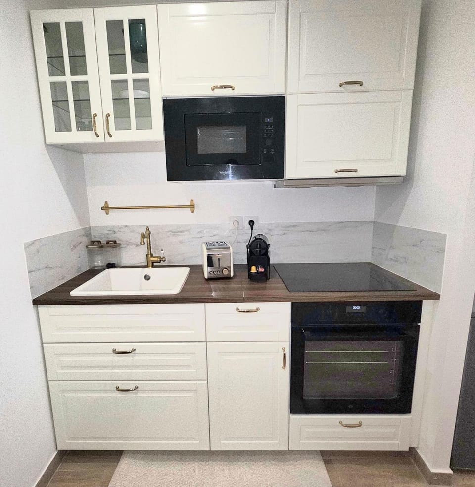 Kitchen or kitchenette, stove