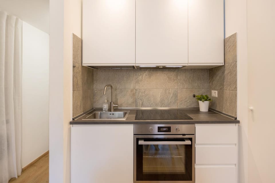 Kitchen or kitchenette, oven