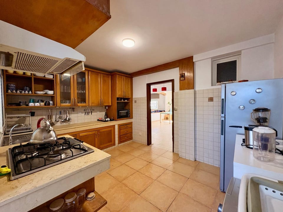 Kitchen or kitchenette, dishwasher, oven, stove
