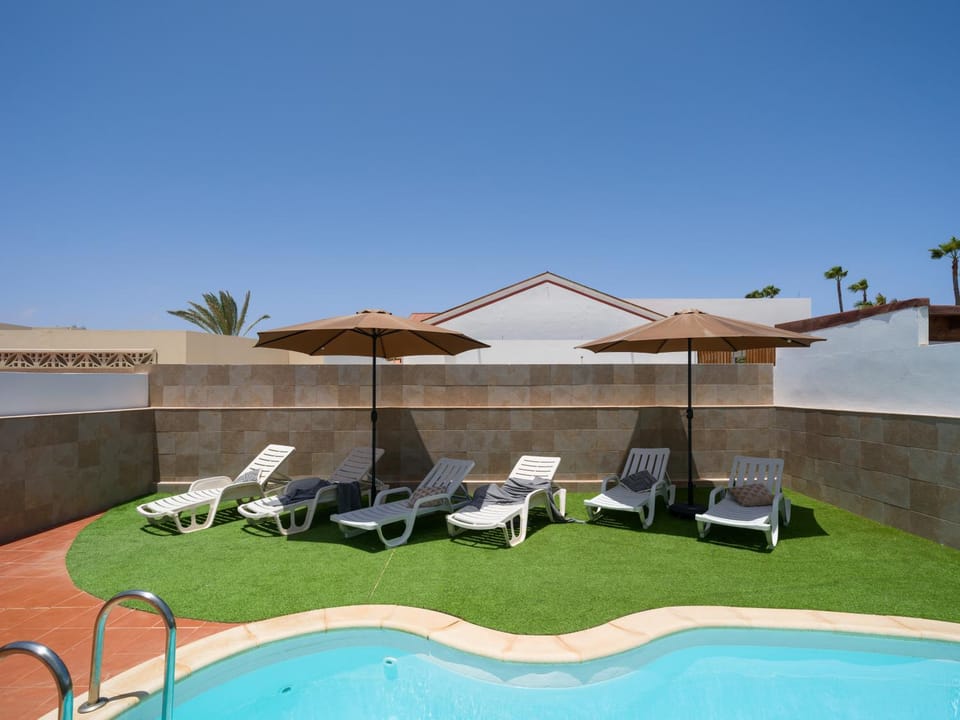 Patio, Day, Pool view, Swimming pool, sunbed