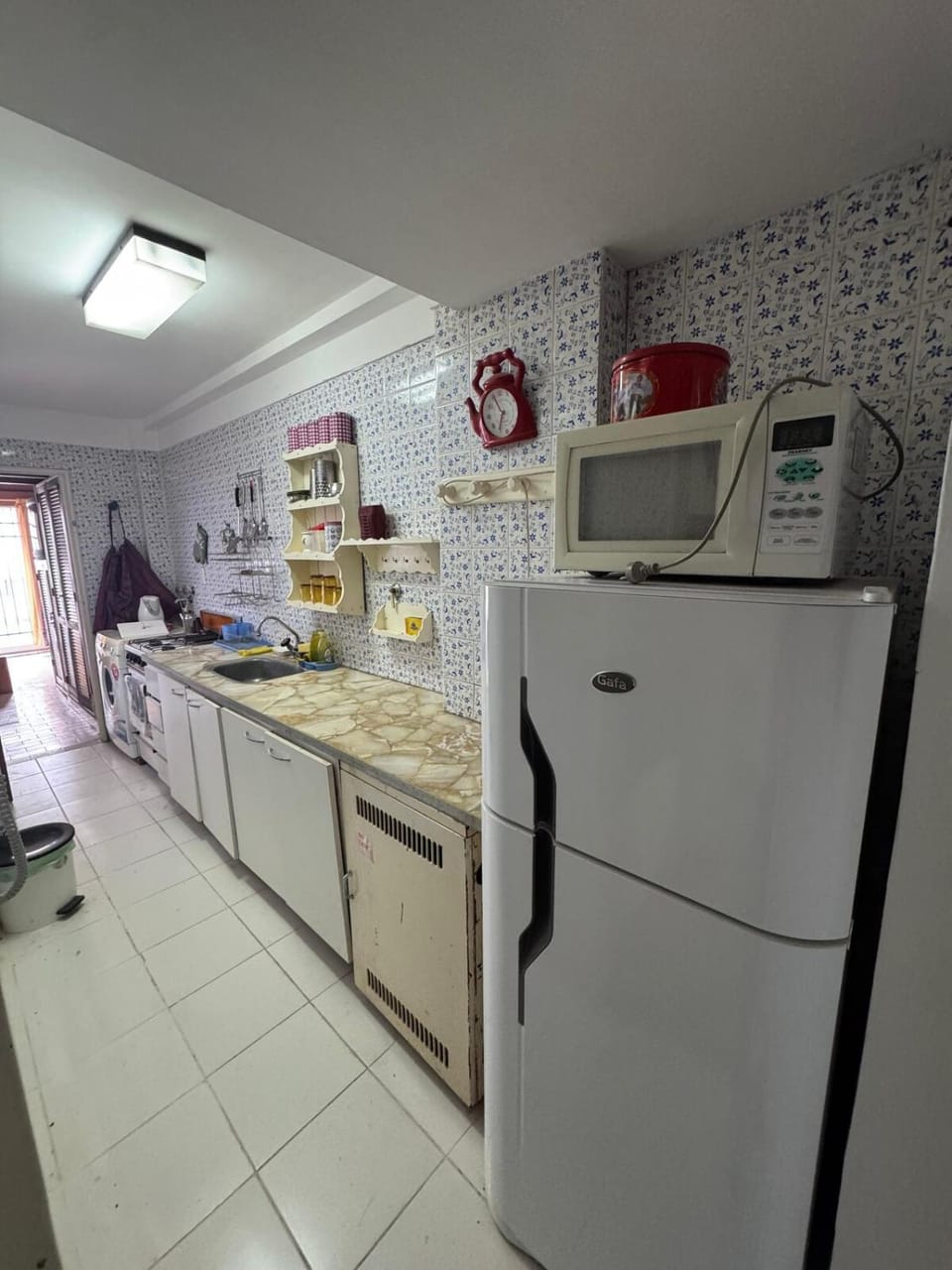 Kitchen or kitchenette, oven