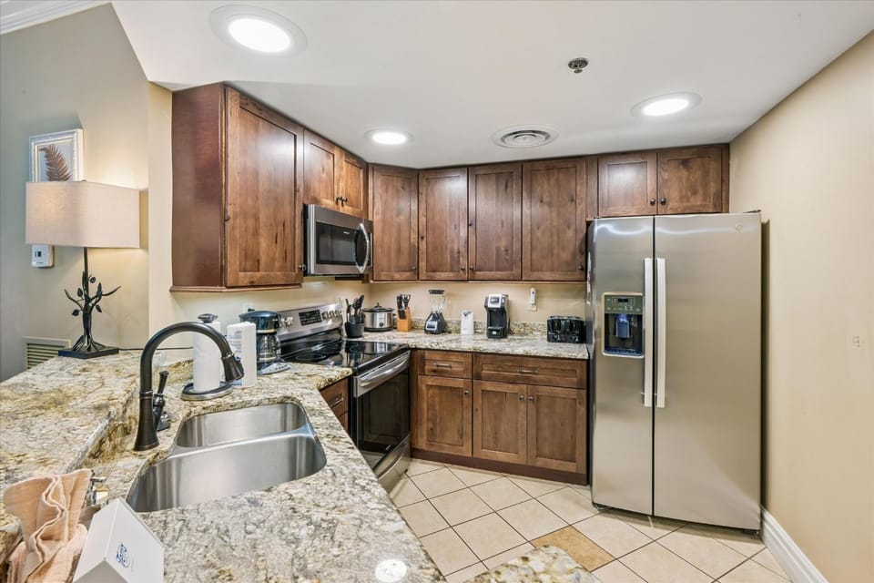 Kitchen or kitchenette, dishwasher, microwave, oven, stove, kitchen
