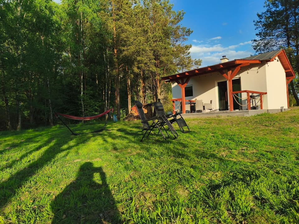 Domek Leśny Zakątek z kominkiem House in Pomeranian Voivodeship