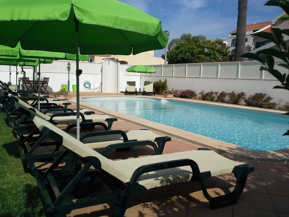 Swimming pool, sunbed