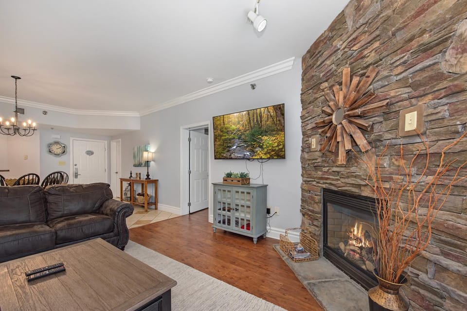 TV and multimedia, Living room, Seating area, fireplace, furniture