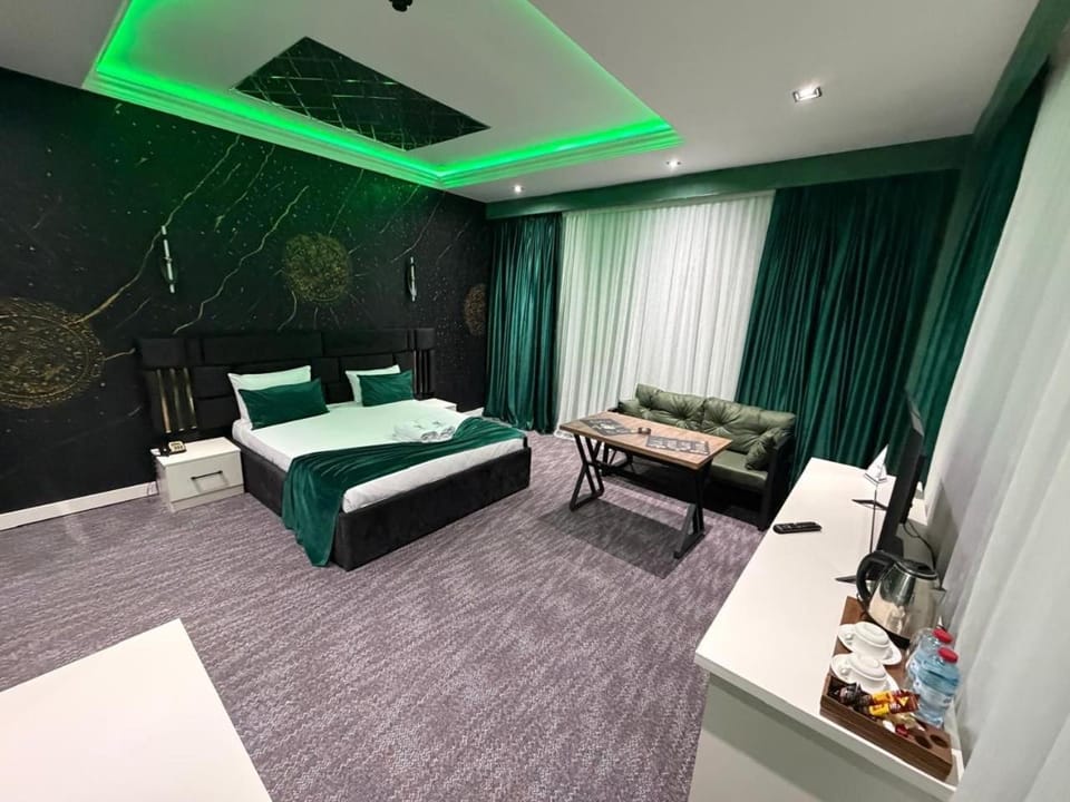Bed, Living room, Seating area, Bedroom