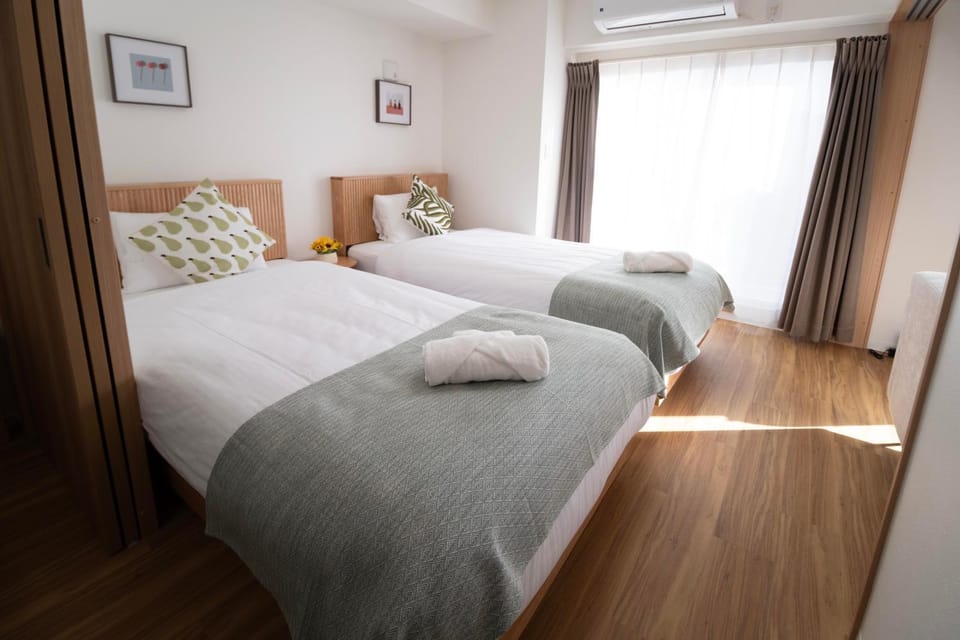 Bed, Photo of the whole room, Bedroom, towels, air conditioner
