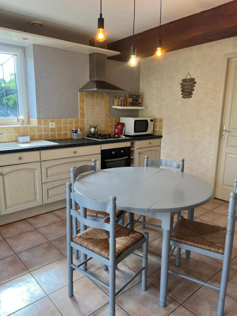 Kitchen or kitchenette, dishwasher, oven, stove