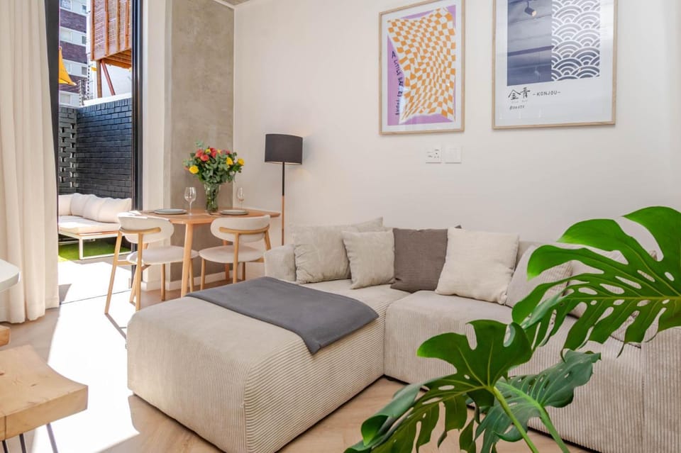 107sqm Designer Flat w/ Patio & Rooftop Pool Apartment in Sea Point