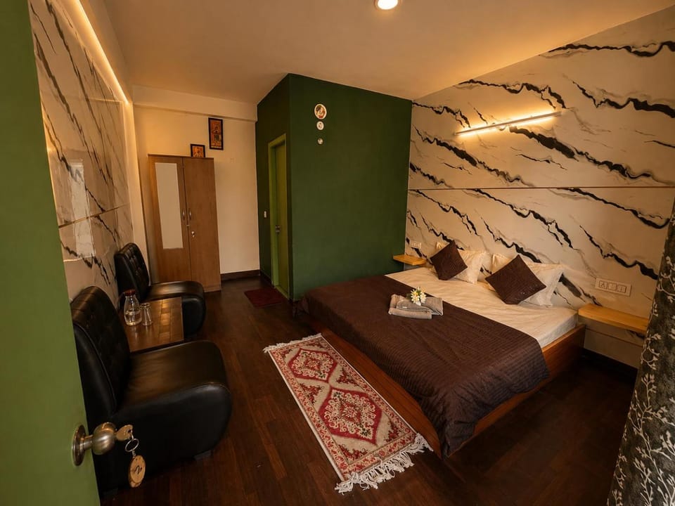 Toilet, Bed, Seating area, Bedroom, bidet, towels, wardrobe