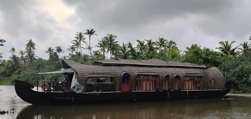 Travianhouseboat kumarakom Docked boat in Kumarakom