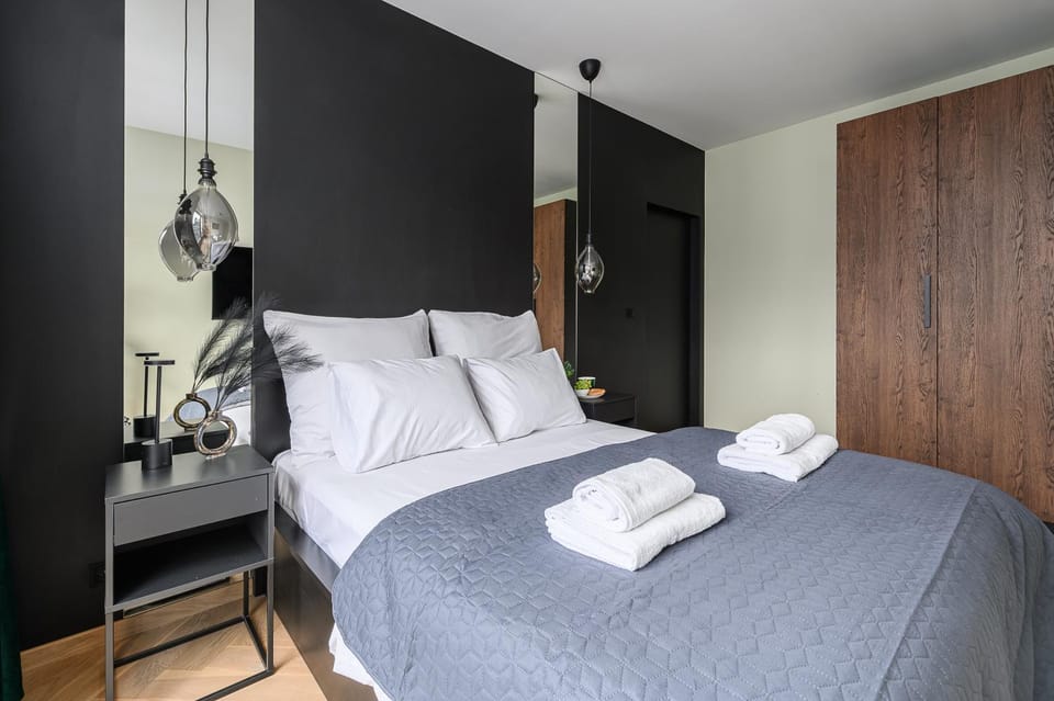 Bed, towels, wardrobe