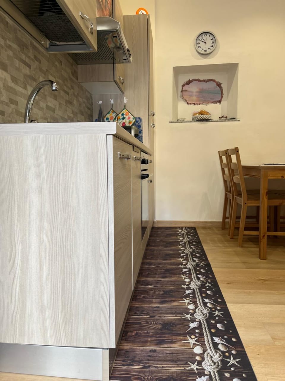 Kitchen or kitchenette, oven, stove