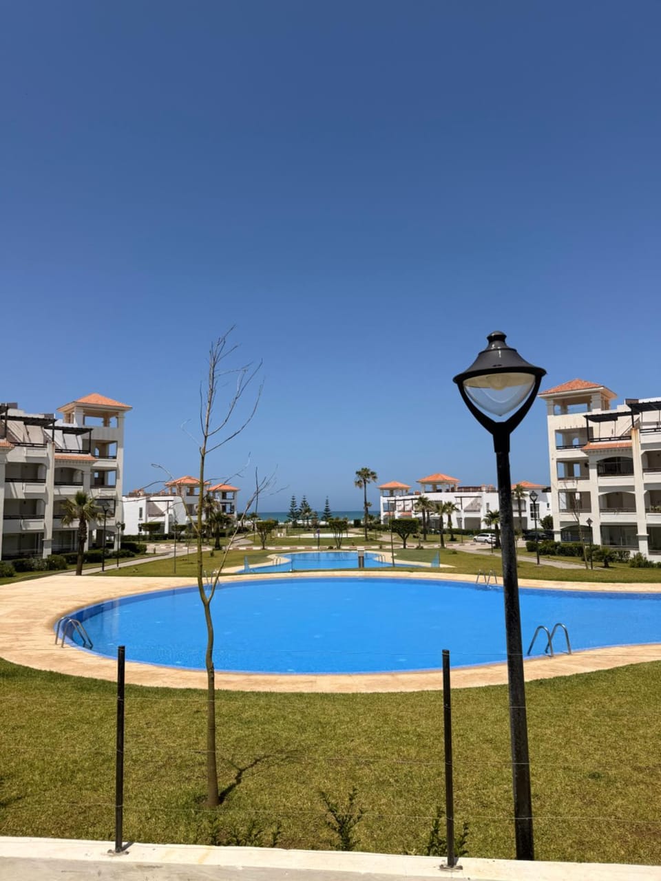 Property building, Day, Natural landscape, Pool view, Swimming pool