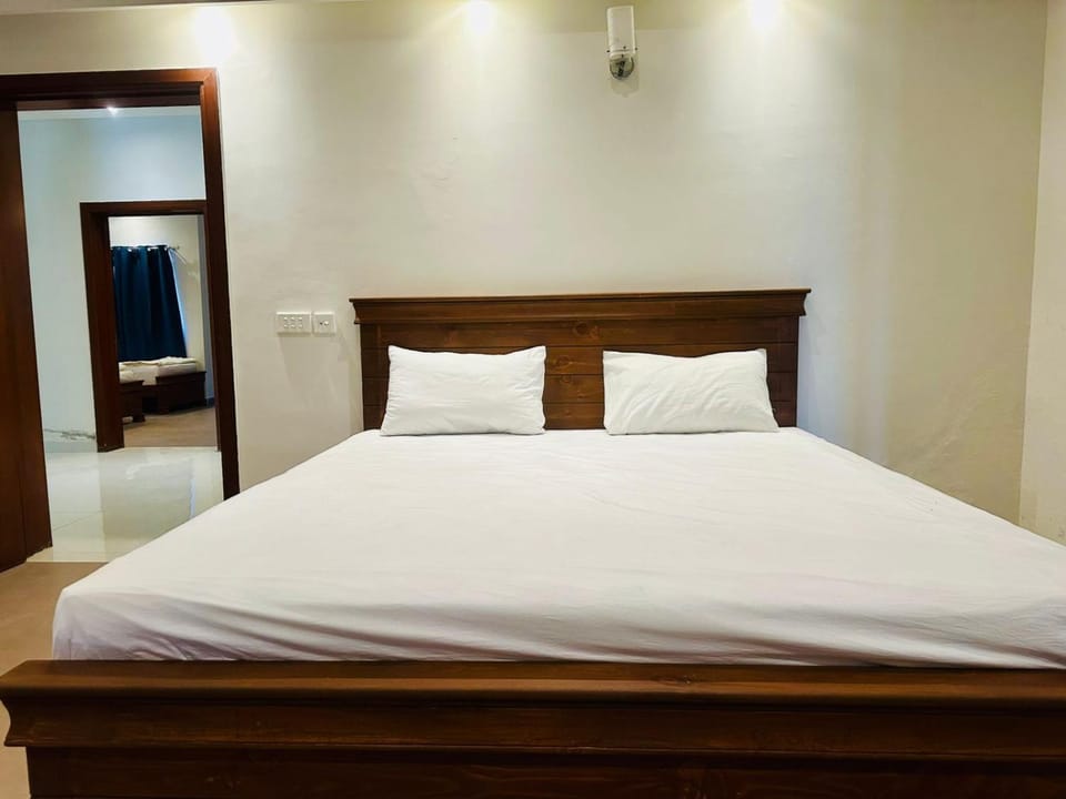 Okasha Tower One Hotel Apartment in Lahore