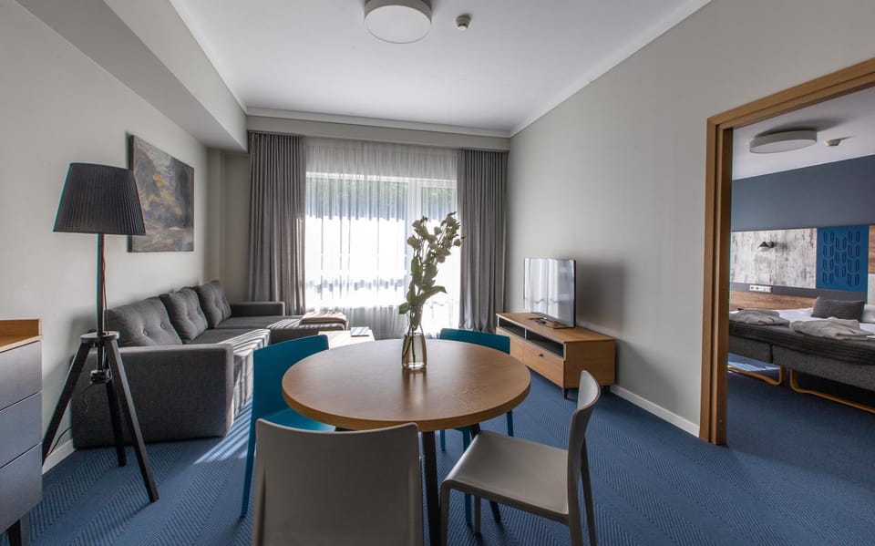 Bed, Living room, Seating area, Bedroom, air conditioner