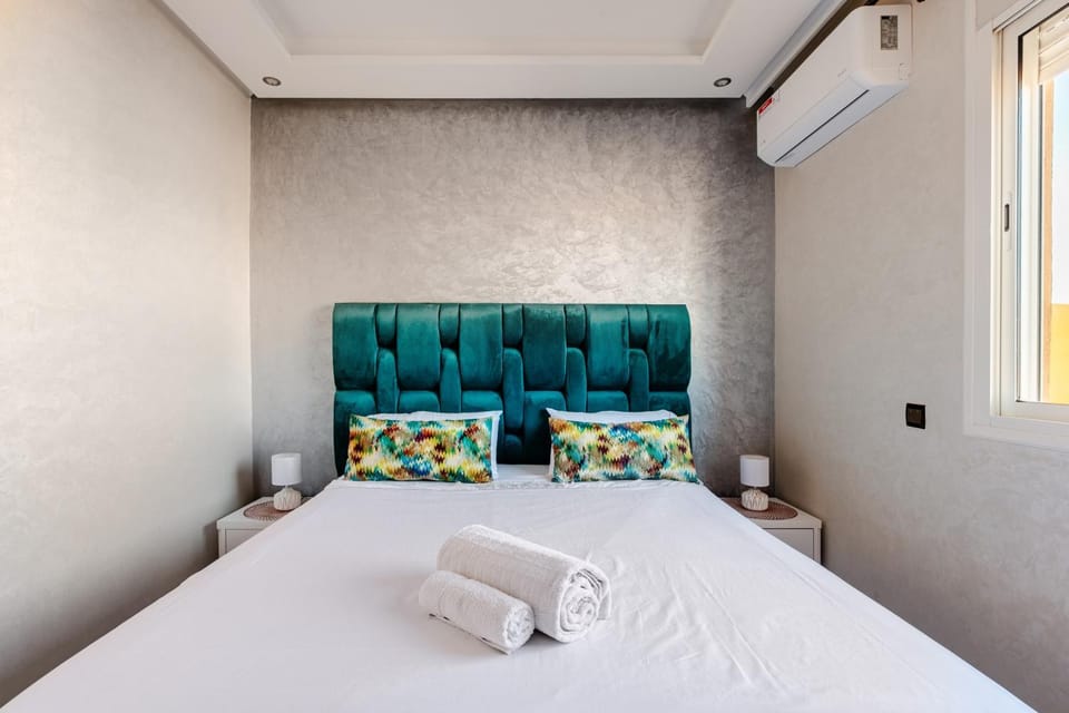Bed, Photo of the whole room, Bedroom, towels, air conditioner