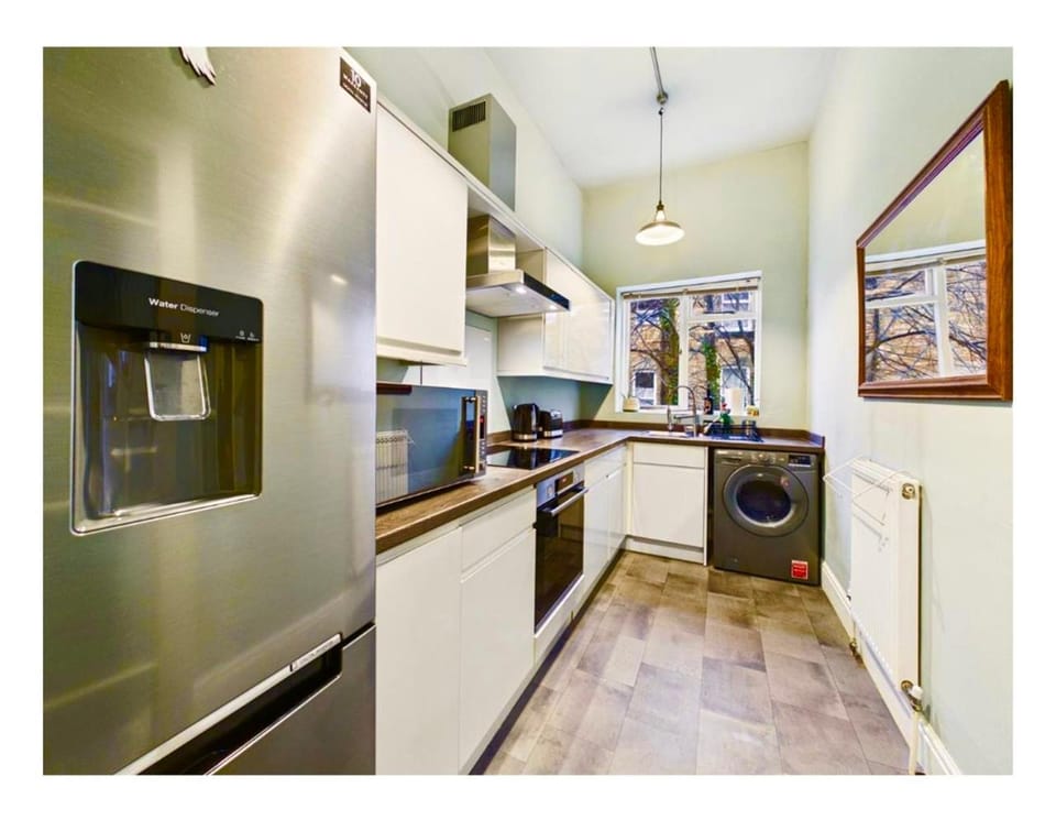 microwave, stove, toaster, washing machine, kitchen