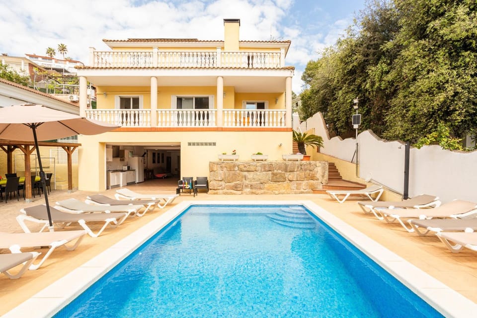 Property building, Living room, Swimming pool