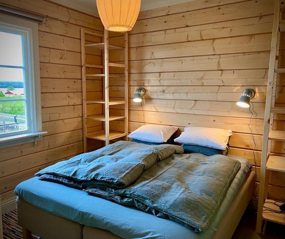 Genuine log cabin with lake views on horse farm Cabin in Sweden