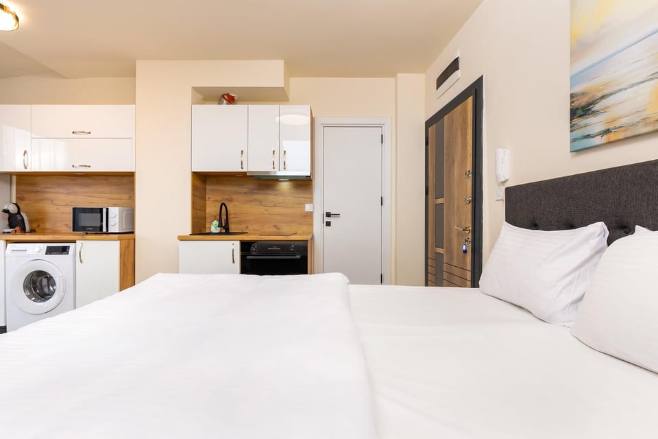 Bed, Kitchen or kitchenette, oven, washing machine