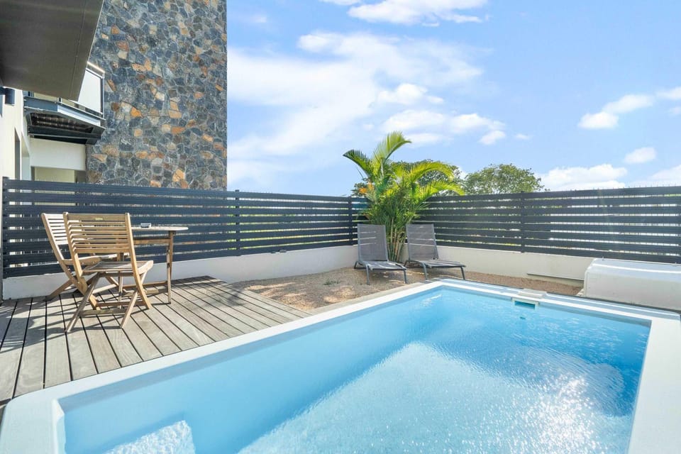Golden Bloom - High-End Duplex w Private Pool Apartment in Rivière Noire District, Mauritius