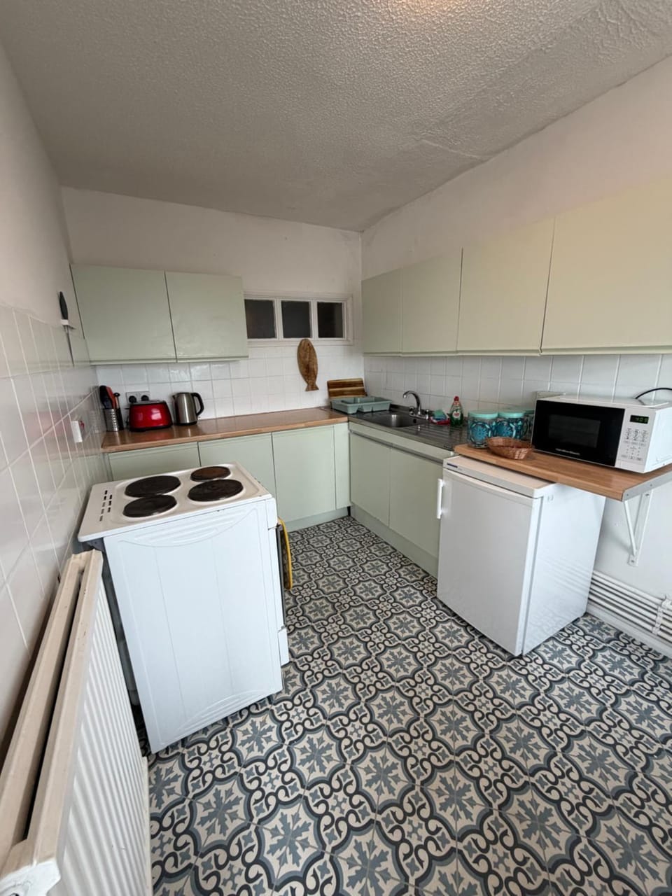 Kitchen or kitchenette, oven, stove, toaster